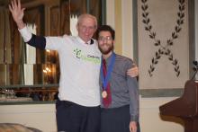 Sam Beard wearing a Code the Change shirt with Sam King